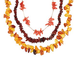 TWO AMBER NECKLACES AND A CORAL NECKLACE, an amber chip bea