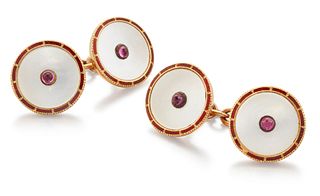 A PAIR OF MOTHER OF PEARL, RUBY AND ENAMEL CUFFLINKS, the r