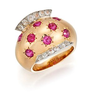 A DIAMOND AND RUBY COCKTAIL RING BY VAN CLEEF AND ARPELS, t