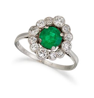A THREE STONE DIAMOND AND EMERALD RING, the round emerald, 