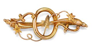 A 9 CARAT GOLD BAR BROOCH, the brooch set with curled stems