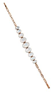 A MOONSTONE BRACELET, the graduated oval moonstones, approx