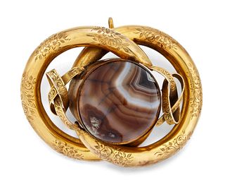 A VICTORIAN BANDED AGATE KNOT BROOCH, the central banded ag
