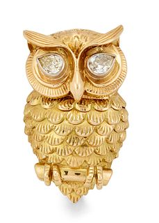 A CARTIER 18 CARAT GOLD AND DIAMOND OWL BROOCH, the stylise