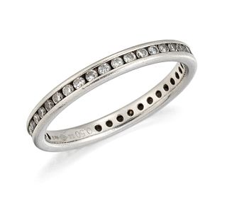 A PLATINUM DIAMOND ETERNITY RING, channel set with small ro