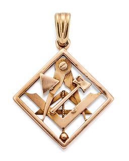 A MASONIC PENDANT, the diamond shaped pendant set with Maso