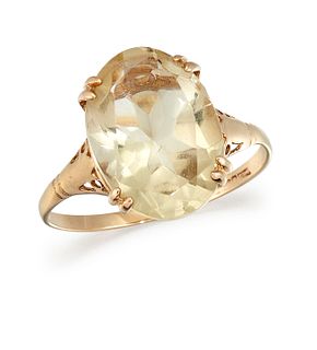 A 9 CARAT GOLD CITRINE RING, the oval faceted citrine, in f