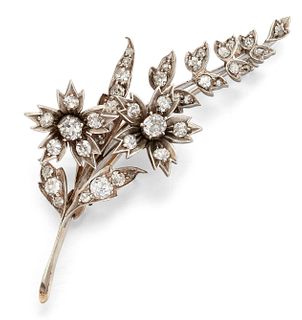 A VICTORIAN DIAMOND SPRAY BROOCH, the spray with two? old c