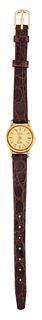 A LADY'S GOLD PLATED OMEGA STRAP WATCH. Circular champagne 