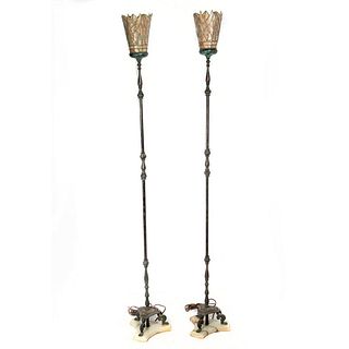 A pair of early Torchere Floor Lamps