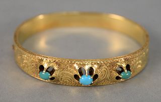 Gold bangle bracelet topped with three oval cabochon turquoise, 17 gr. Provenance: Estate of Marilyn Ware, Strasburg, Pennsylvania.