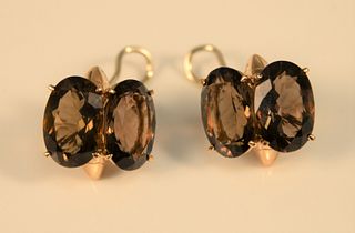 Pair 18K rose gold and smoky quartz Antonini earrings centering four oval smoky quartz, signed 'Antonini'. 22.5 gr. Provenance: Estate of Marilyn Ware