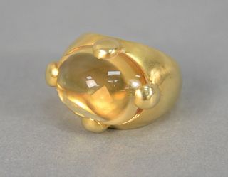 18K gold ring set with cabochon citrine, 14.2 gr. total weight. Provenance: Estate of Marilyn Ware, Strasburg, Pennsylvania.