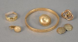 Six piece 10K - 14K gold lot to include 1 cufflink, 1 push pin and 2 separate earrings, total 5.5 dwt.