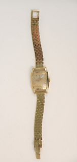 14K gold Omega wristwatch with 14K gold band, total wt. 27.5 gr.