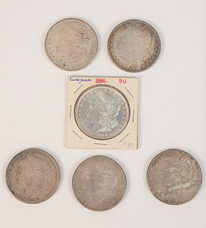 Six silver dollars to include, 1928 Peace dollar UF, 1928-5 Peace dollar UF along with 1894 - 0 silver dollar XF, 1891 - 0 silver dollar G, 1896 silve