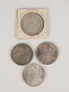 Four Silver dollars circulated to brilliant uncirculated.
