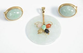 Three piece jade and 14K lot with pair of light green jade cabochon earrings mounted in 14K gold and white jade disc mounted with gold and small stone