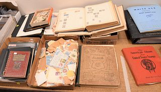 Group of fifteen stamp albums and many loose stamps plus sheets and blocks.