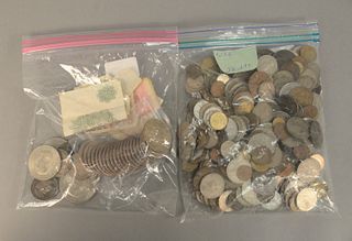 Large coin lot of foreign, some U.S. and some silver along with one mixed lot (21) Eisenhower dollars, some foreign (3) Columbian expo, 1/2 dollars, l