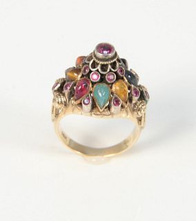 18K gold Thai princess ring set with various stones, ruby, sapphire, moonstone, topaz, garnet, agate, etc., size 7.5, 9.3 gr. Provenance: Estate of Dr