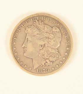 1 - 1878 Carson City silver dollar.