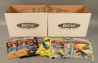 Two boxes of mixed comics to include Superman Man of Steel, Peter Parker Spiderman, Supergirl, etc.