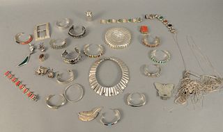 Large group of sterling silver jewelry to include bracelets, necklaces, pins, etc., 39.3 t.oz. with stones.