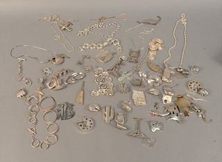 Large group of sterling silver jewelry to include bracelets, necklaces, pins, earrings, etc., approximately 27.5 t.oz.