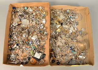 Large group of sterling silver and costume jewelry, two tray lots to include earrings, pins, pendants, bracelets and necklaces.