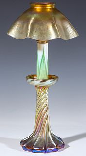 A LOUIS COMFORT TIFFANY GOLD FAVRILE CANDLE LAMP