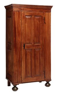 A CIRCA 1800 CONTINENTAL FRUITWOOD ONE DOOR CABINET