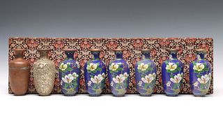 EIGHT CLOISONNE VASES IN VARIOUS STAGES OF CREATION