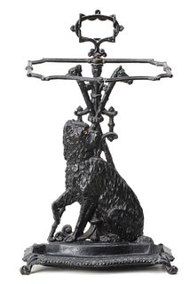 A CAST IRON DOG FIGURAL UMBRELLA AND CANE STAND AS-IS