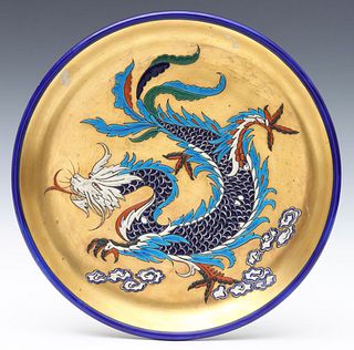A FRENCH ART POTTERY CHARGER WITH DRAGON IN ENAMELS