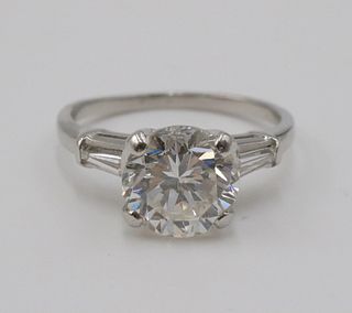 Modern Round Brilliant Diamond and Platinum Ring