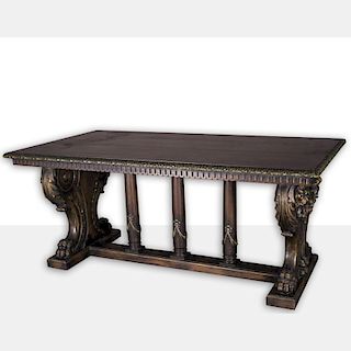 A Renaissance Revival Style Carved Walnut Table, 20th Century.
