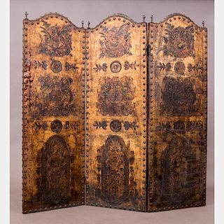 A Continental Three Panel Leather Embossed Floor Screen, 19th/20th Century.
