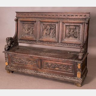 A Continental Heavily Carved Oak Bench, 20th Century.