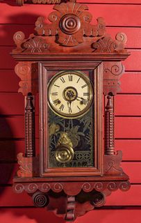 AN UNIDENTIFIED FANCY HANGING CHERRY PARLOR CLOCK