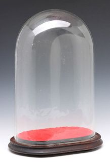 A SCARCE 19TH CENTURY OVAL BLOWN GLASS CLOCK DOME