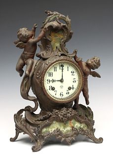 A FRENCH ROCOCO STYLE ANSONIA CLOCK WITH GREEN ONYX