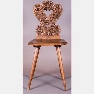 A Continental Carved Walnut Side Chair, 19th Century.