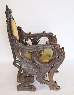 19th Century Highly Carved Winged Griffin Chair.