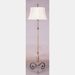 An Italian Wrought Metal and Brass Floor Lamp, 20th Century.
