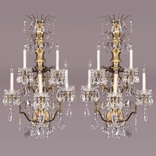 A Pair of Louis XV Style Five Arm Brass and Crystal Wall Sconces, 20th Century.