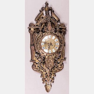 A Louis XV Style Ormolu Cartel Clock, 19th Century.