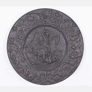 A Large Hand-Hammered Metal Plaque, 19th/20th Century.