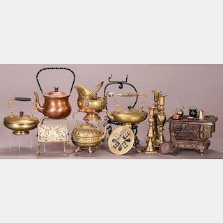 A Miscellaneous Collection of Eleven Brass and Iron Decorative and Serving Items, 20th Century.