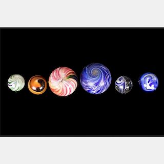 A Collection of Six Handmade Glass Marbles, 20th Century.